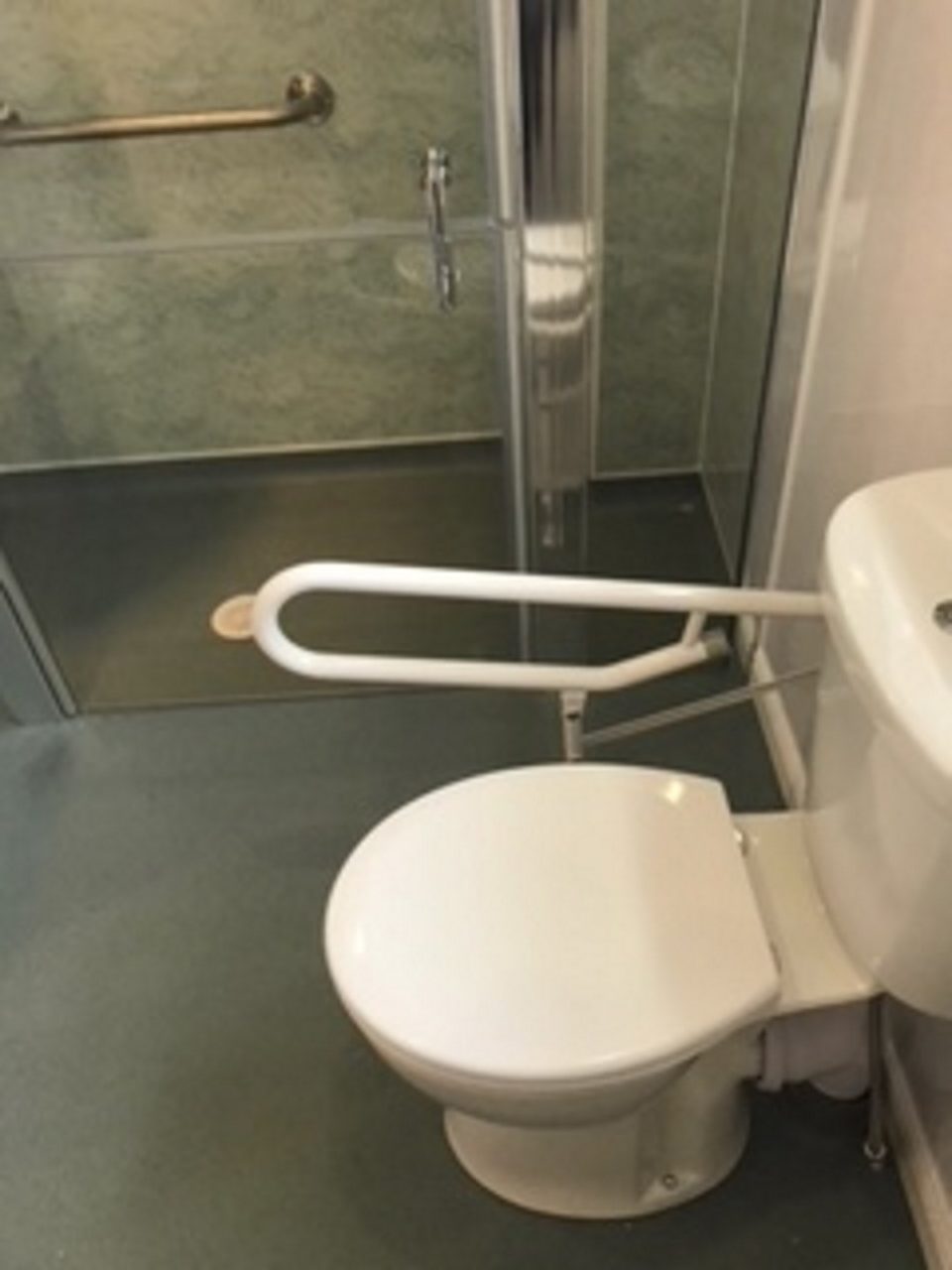 Wet Room Installer in Tamworth - functional glass screen to allow assistance - Example of Wetroom installed with disabled toilet grab rails